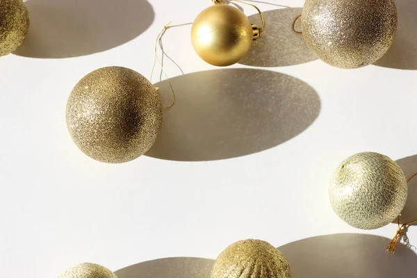 Golden Christmas Decorations White Background Winter Holidays Golden Baubles Background Stock Image