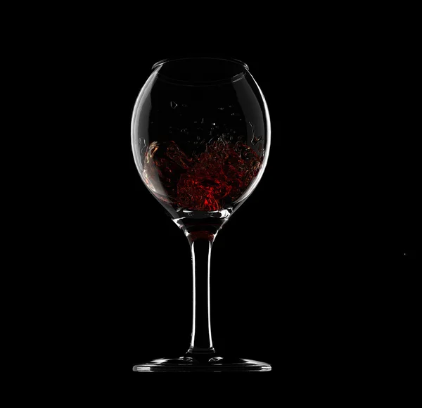 Copo de vinho com respingo de vinho dentro — Fotografia de Stock