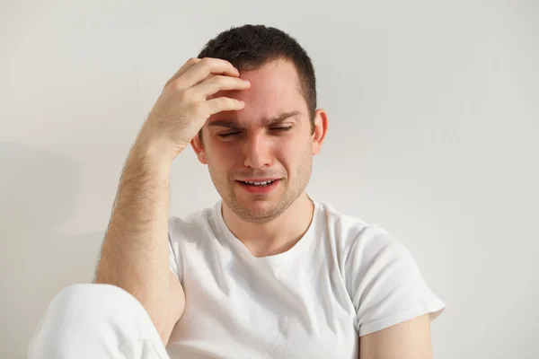 Emotional handsome young man crying — Stock Photo, Image