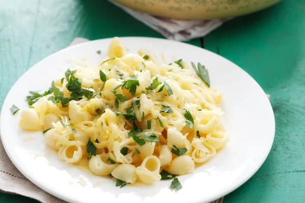 Pasta with cheese and lemon peel — Stock Photo, Image