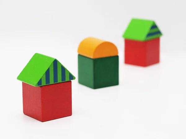 Tres casas de juguetes —  Fotos de Stock