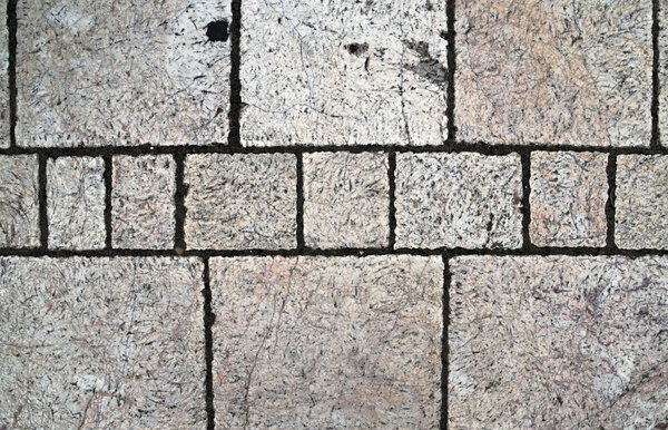 Background or texture with lumps of stone tiles
