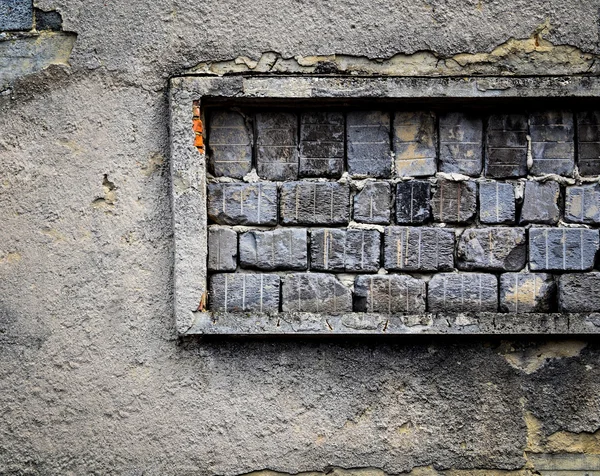 Bricked up window in old wall — Stock Photo, Image