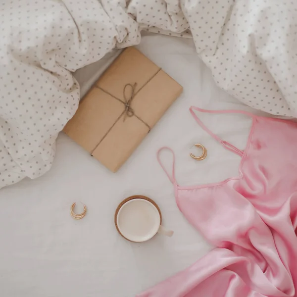 Beautiful feminine flatlay frame arrangement with lingerie, coffee cup, jewerly and other accessories top view — Stock Photo, Image