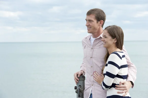 Young Caucasian couple at the pier — Stock Photo, Image