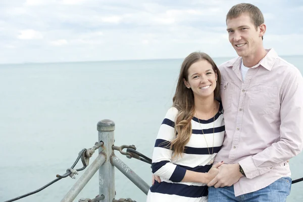Happy couple on the pier — Stock Photo, Image