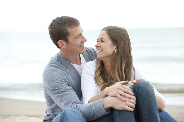 Young couple on the beach Royalty Free Stock Images