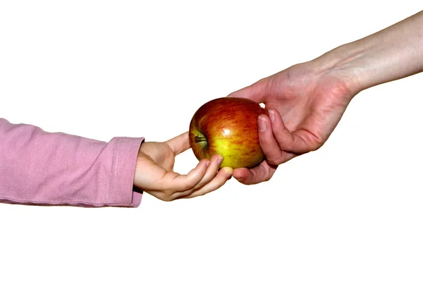 Hand of woman and child with the apple — Stock Photo, Image