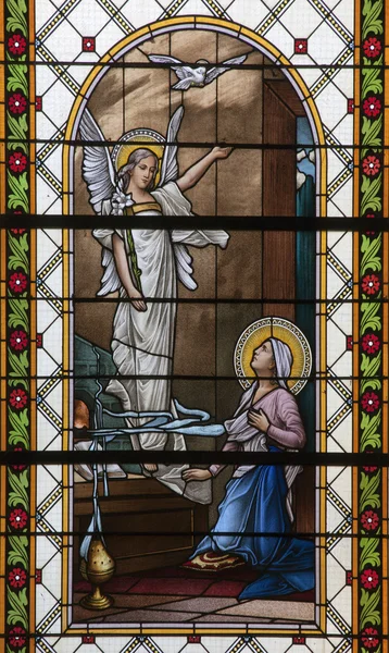 LEVOCA - AUGUST 1: Annunciation from windowpane in Basilica of Visitation of Virgin Mary on August 1, 2012 in Levoca, Slovakia. — Stock Photo, Image