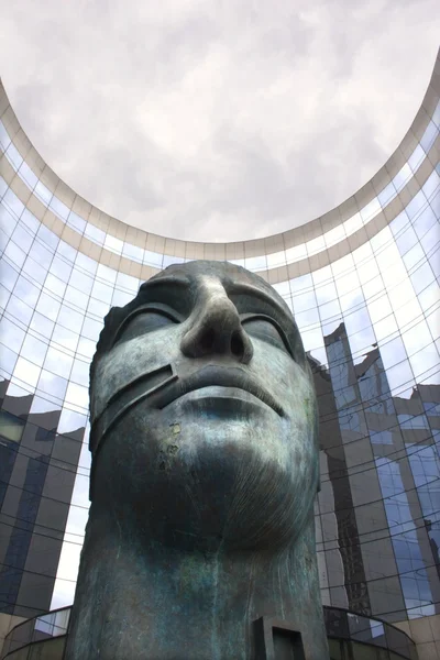 Paris - modern head sculpture from La Defensé — Stok fotoğraf
