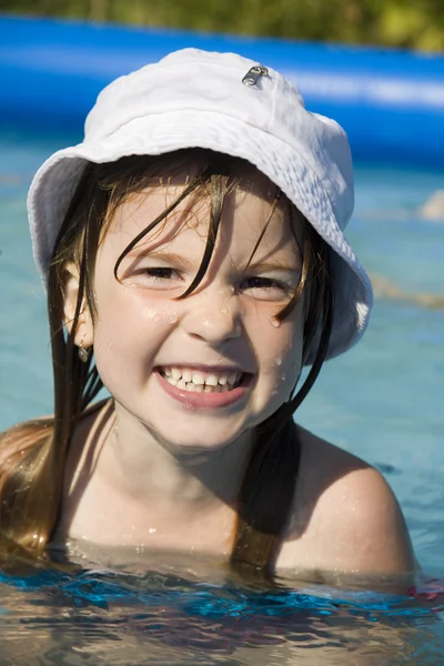 Little girl in basin - smile Stock Photo