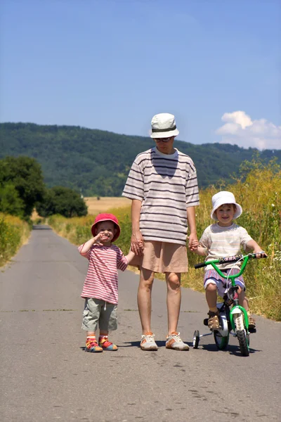 Mother and little daughters — Stock Photo, Image