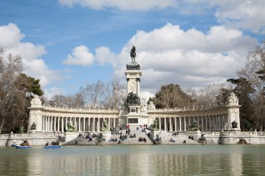 MADRID - MARCH 9: Monument of Alfonso XII in Buen Retiro park by architect Jose Grases Riera from year 1902 in March 9, 2013 in Spain. clipart