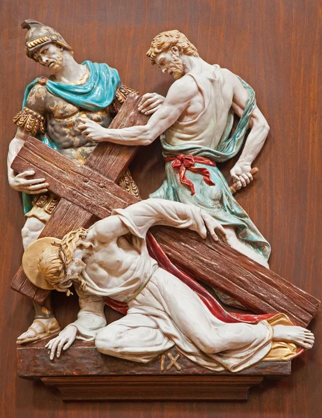 VERONA - JANUARY 28: Jesus is nailed to the cross. One part of ceramic coss way from st. Nicholas church (Chiesa di San Nicolo) on January 28, 2013 in Verona, Italy. — Stock Photo, Image