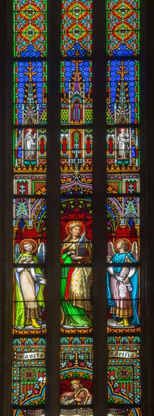 Bratislava, Slowakije - 14 januari 2014: saint cecilia op windowpane van 19. van fabrikanten van karol geyling en eduard kratzmann in de kathedraal van st. martin. — Stockfoto