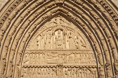 Paris - ayrıntılı yan Portal, notre dame Katedrali günbatımı ışığı