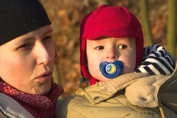 Mother and baby - portrait in winter evening — Stock Photo, Image