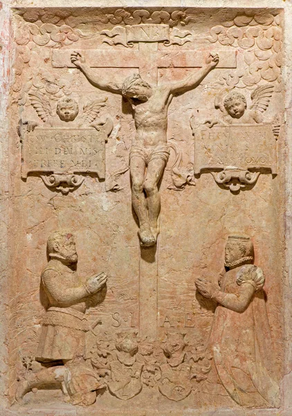 BRATISLAVA, SLOVAKIA - FEBRUARY 11, 2014: Relief of crucifixion. Detail from tomb stone in crypt under st. Ann chapel in st. Martin cathedral. — Stock Photo, Image