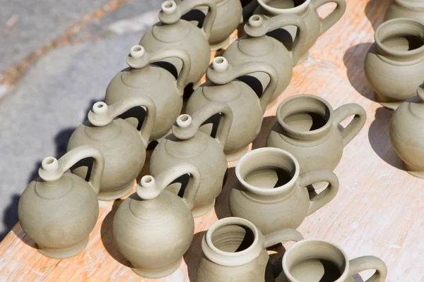 Jugs from potery workroom — Stock Photo, Image