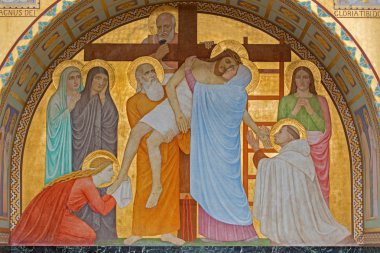 VIENNA, AUSTRIA - FEBRUARY 17, 2014: Deposition of the cross scene over st. John of the Cross side altar by P. Verkade (1927) in Carmelites church in Dobling. clipart