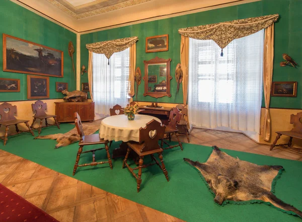 SAINT ANTON, SLOVAKIA - FEBRUARY 26, 2014: Tyrols hunter eating room in palace Saint Anton from 19. cent.. — Stock Photo, Image