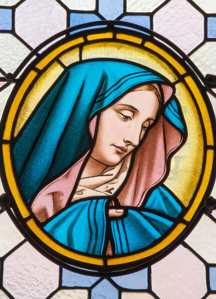 VIENVIENNA, AUSTRIA - FEBRUARY 17, 2014: Virgin Mary from windowpane in Carmelites church in Dobling by "Geyling" workroom from the beginning of the 20. cent.
