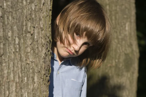 Sorrow of little girl in the wood — Stock Photo, Image