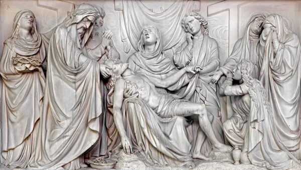 MECHELEN, BELGIUM - JUNE 14, 2014: Stone relief of Pieta of the Deposition of the cross in church Our Lady across de Dyle. — Stock Photo, Image