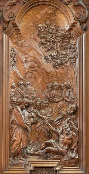 MECHELEN, BELGIUM - JUNE 14, 2014: The Miracle of Apostle John and Peter healing the lame carved relief by Ferdinand Wijnants in st. Johns church or Janskerk from begin of 20. cent. — Stock Photo, Image