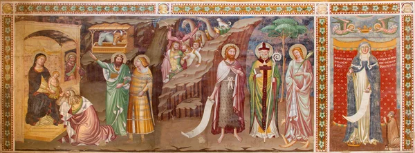 Treviso, Itálie - 18 března 2014: freska zbožňování magi a svaté Markéty (1370) v kostele svatého Mikuláše nebo san nicolo. — Stock fotografie