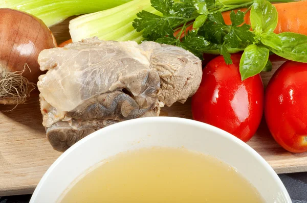 Beef broth with a piece of veal — Stock Photo, Image