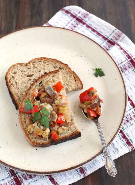 Sandwiches with eggplant caviar on the plate — Stock Photo, Image