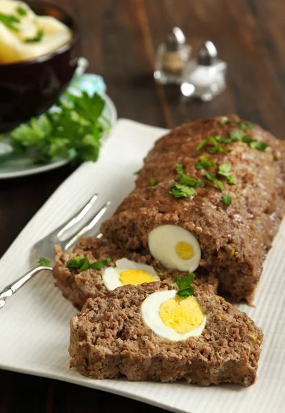 Sliced meatloaf with egg — Stock Photo, Image