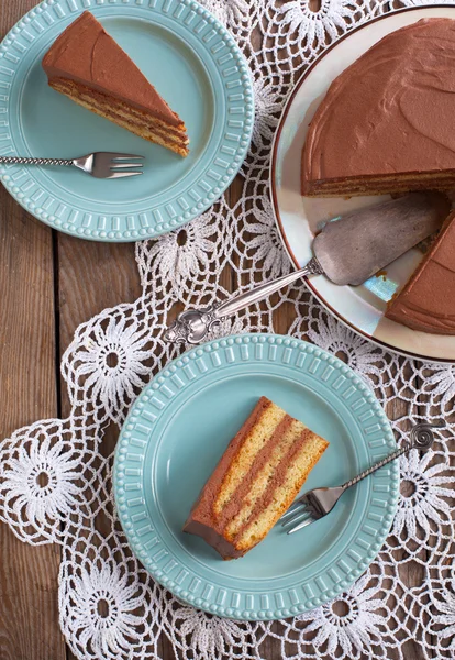 Sponge cake with chocolate cream — Stock Photo, Image