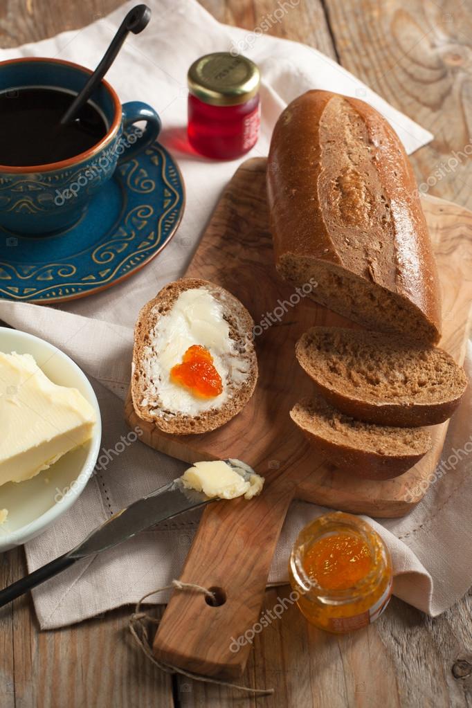 Breakfast with coffee, bread, butter and jam — Stock Photo © Anjela30