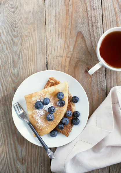 Crepes with blueberries and sugar powder — Zdjęcie stockowe