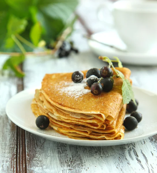Crepes with black currant — Stock Photo, Image