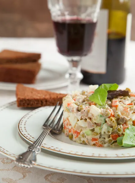 Russian traditional salad Olivier. Selective focus — Stock Photo, Image