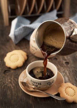 Cup of coffee and cookies clipart