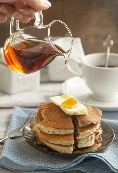 Stack of pancakes with butter and maple syrup — Stock Photo, Image