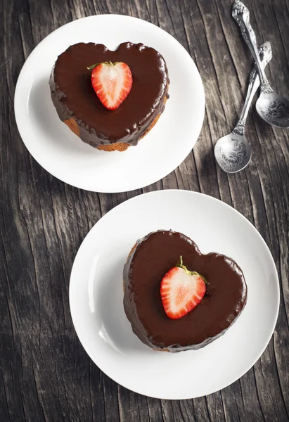 Heart shaped cakes with chocolate and strawberry — Stock Photo, Image