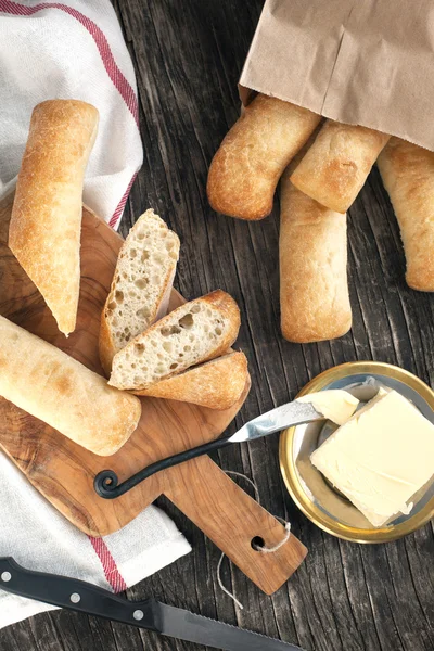 Ciabatta sticks and butter — Stock Photo, Image