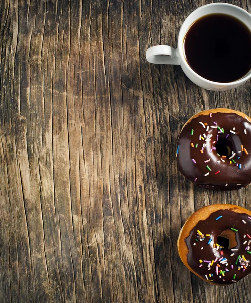 Donuts e xícara de café — Fotografia de Stock