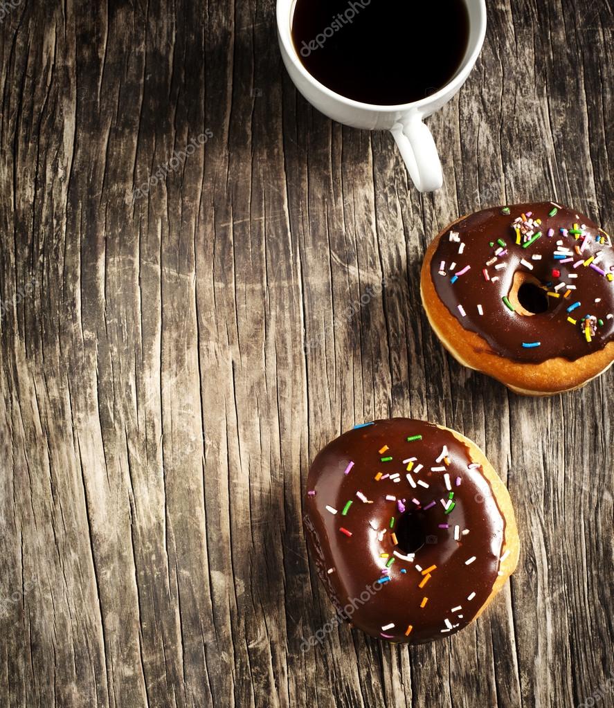 Donuts and cup of coffee Stock Photo by ©Anjela30 51547223