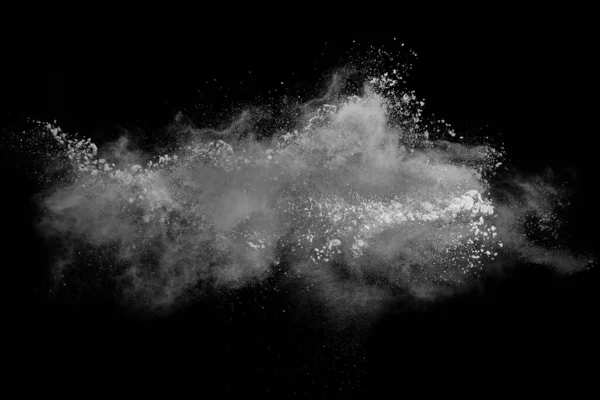 黑色背景的白色粉末爆炸 五颜六色的灰尘爆炸了 油漆Holi 免版税图库图片