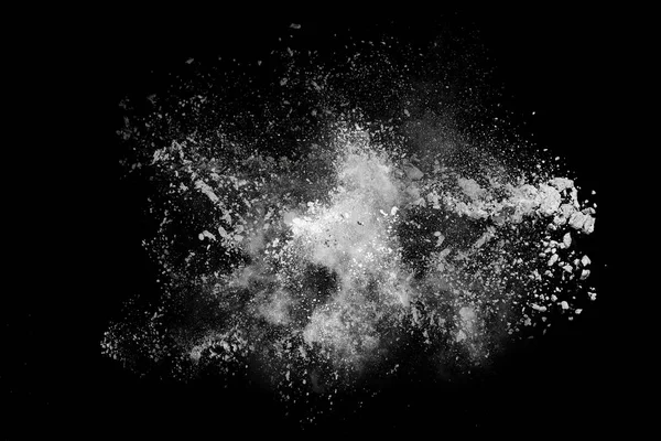 黑色背景的白色粉末爆炸 五颜六色的灰尘爆炸了 油漆Holi 图库图片