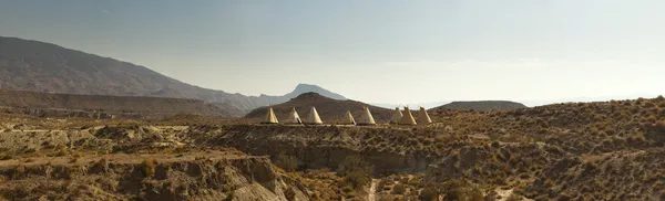 Panoramic photo of western landscape with indian tipis. Fort Bravo. Texas Hollywood. Desierto de Tabernas, Almeria. Andalusia. Spain. — Stock Photo, Image