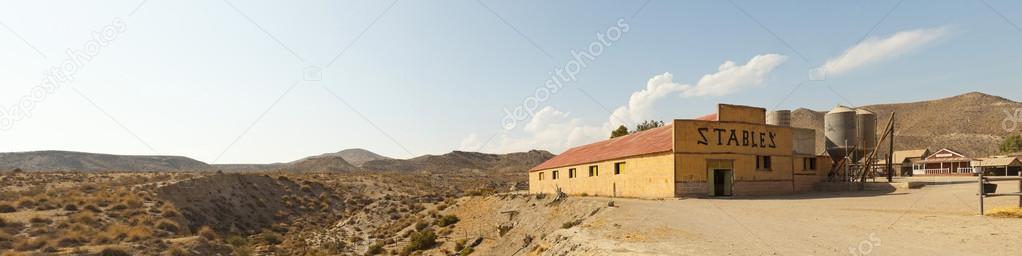 Panoramic photo of stables in the western movie town Fort Bravo. Texas Hollywood. Desierto de Tabernas, Almeria. Andalusia. Spain.