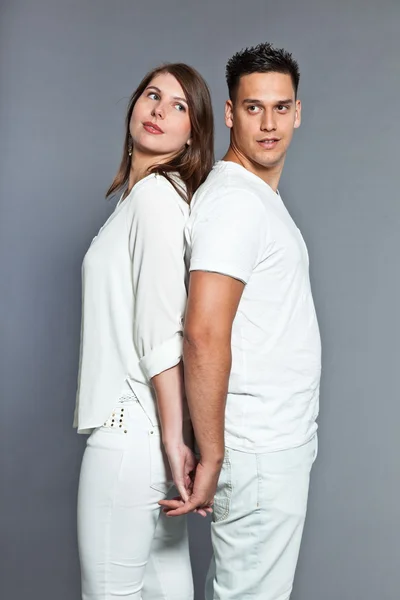 Diverse young happy couple together. Dressed in white. — Stock Photo, Image