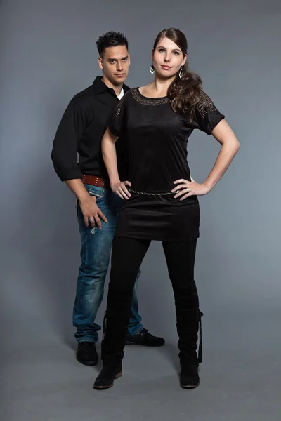 Diverse young couple together. Dressed in black. — Stock Photo, Image